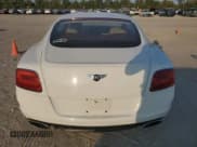 ✅ 2014 Bentley Continental GT • VIN: SCBFC7ZA8EC095924 • Lot: 87044205. Listed on Copart with 23,003 mi. Free auction sales archive from the USA and detailed vehicle history report at DreamBid. Image 6.