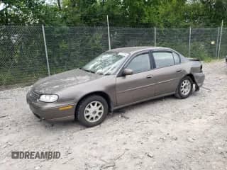 1999 Chevrolet Malibu LS z VIN 1G1NE52M2X6144170, wystawiony jako Copart lot #62370795 z przebiegiem 144 447 mil mil oraz Szkoda całkowita • Salvage title. Historia ofert i sprzedaży dostępna na DreamBid. Obrazek 1.