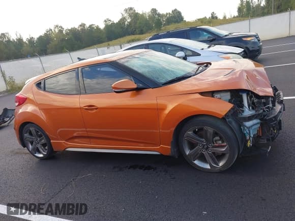 ✅ 2014 Hyundai Veloster Turbo • VIN: KMHTC6AE9EU208312 • Lot: 43273422. Listed on IAAI with 102,780 mi. Free auction sales archive from the USA and detailed vehicle history report at DreamBid. Image 14.