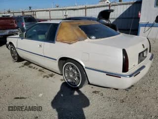 ✅ 2002 Cadillac Eldorado ESC • VIN: 1G6EL12YX2B102292 • Лот: 78470684. Опубликован ранее на Copart с пробегом 86 760 миль. Бесплатный доступ к архиву аукционных продаж из США и подробный отчёт об истории автомобиля на DreamBid. Изображение 2.