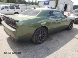 ✅ 2022 Dodge Challenger SXT • VIN: 2C3CDZAG9NH151735 • Lot: 65653964. Wystawiony na Copart z przebiegiem 57 310 mil. Bezpłatny archiwum sprzedaży aukcyjnych z USA i szczegółowy raport historii pojazdu na DreamBid. Zdjęcie 3.