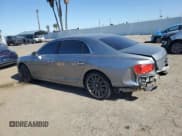 ✅ 2014 Bentley Flying Spur • VIN: SCBEC9ZA7EC090575 • Lot: 57110315. Listed on Copart with 19,083 mi. Free auction sales archive from the USA and detailed vehicle history report at DreamBid. Image 2.