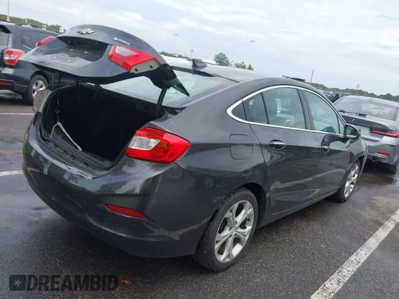 ✅ 2017 Chevrolet Cruze Premier • VIN: 1G1BF5SM9H7103630 • Lot: 43307644. Listed on IAAI with 119,658 mi. Free auction sales archive from the USA and detailed vehicle history report at DreamBid. Image 4.