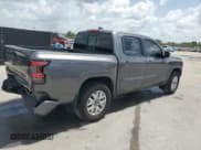 ✅ 2022 Nissan Frontier SV • VIN: 1N6ED1EJ0NN604995 • Lot: 60085685. Listed on Copart with 65,069 mi. Free auction sales archive from the USA and detailed vehicle history report at DreamBid. Image 3.