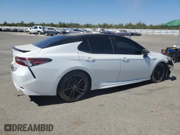 ✅ 2021 Toyota Camry Hybrid XSE • VIN: 4T1K31AK0MU028493 • Lot: 68765375. Listed on Copart with 125,781 mi. Free auction sales archive from the USA and detailed vehicle history report at DreamBid. Image 3.