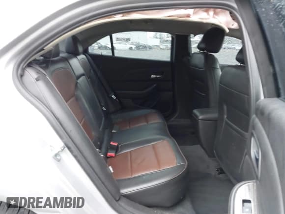 ✅ 2015 Chevrolet Malibu LTZ • VIN: 1G11F5SL3FF282110 • Lot: 43516279. Listed on IAAI with 131,961 mi. Free auction sales archive from the USA and detailed vehicle history report at DreamBid. Image 18.