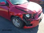 ✅ 2014 Chevrolet Sonic LT • VIN: 1G1JC5SH6E4143068 • Lot: 43754575. Listed on IAAI with 139,861 mi. Free auction sales archive from the USA and detailed vehicle history report at DreamBid. Image 6.