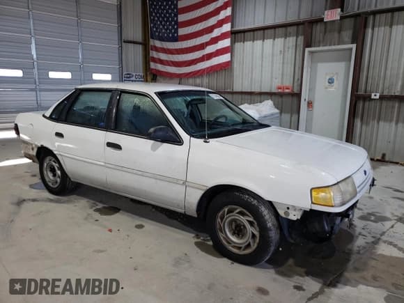 ✅ 1993 Ford Tempo GL • VIN: 2FAPP36X2PB104844 • Лот: 81046964. Опубликован ранее на Copart с пробегом 5 951 миль. Бесплатный доступ к архиву аукционных продаж из США и подробный отчёт об истории автомобиля на DreamBid. Изображение 4.