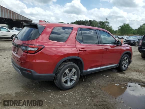 ✅ 2023 Honda Pilot EX-L • VIN: 5FNYG1H57PB019242 • Lot: 51836705. Listed on Copart with 23,270 mi. Free auction sales archive from the USA and detailed vehicle history report at DreamBid. Image 3.