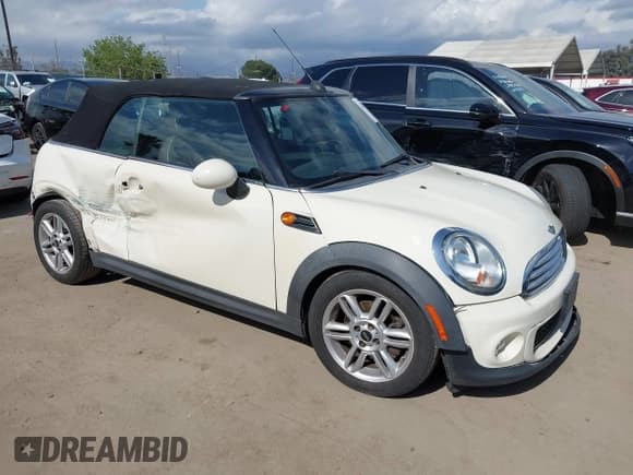✅ 2012 MINI Convertible • VIN: WMWZN3C53CT134194 • Lot: 42261686. Listed on IAAI with 104,099 mi. Free auction sales archive from the USA and detailed vehicle history report at DreamBid. Image 1.