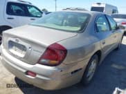 ✅ 2001 Oldsmobile Aurora • VIN: 1G3GR62H414102471 • Lot: 42312588. Listed on IAAI with Not provided. Free auction sales archive from the USA and detailed vehicle history report at DreamBid. Image 4.