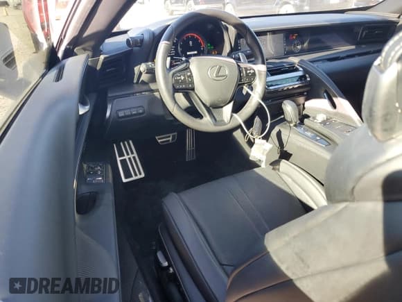 ✅ 2022 Lexus LC 500h • VIN: JTHMPAAY2NA104853 • Лот: 87389064. Опубликован ранее на Copart с пробегом 22 590 миль. Бесплатный доступ к архиву аукционных продаж из США и подробный отчёт об истории автомобиля на DreamBid. Изображение 8.