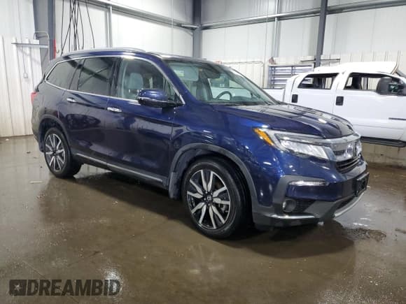 ✅ 2022 Honda Pilot Touring 8-Passenger • VIN: 5FNYF6H95NB034032 • Lot: 85515885. Listed on Copart with 42,443 mi. Free auction sales archive from the USA and detailed vehicle history report at DreamBid. Image 4.