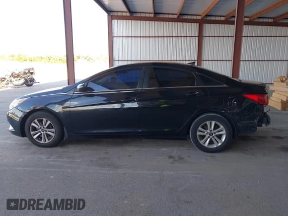 ✅ 2013 Hyundai Sonata GLS • VIN: 5NPEB4AC5DH757811 • Lot: 43591863. Listed on IAAI with 188,721 mi. Free auction sales archive from the USA and detailed vehicle history report at DreamBid. Image 14.