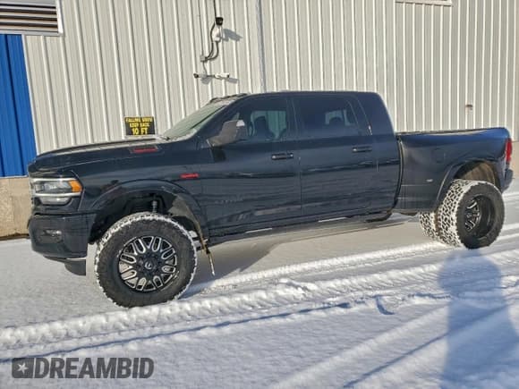 ✅ 2022 Ram 3500 Laramie • VIN: 3C63RRML1NG211777 • Lot: 94038035. Listed on Copart with 74,067 mi. Free auction sales archive from the USA and detailed vehicle history report at DreamBid. Image 1.