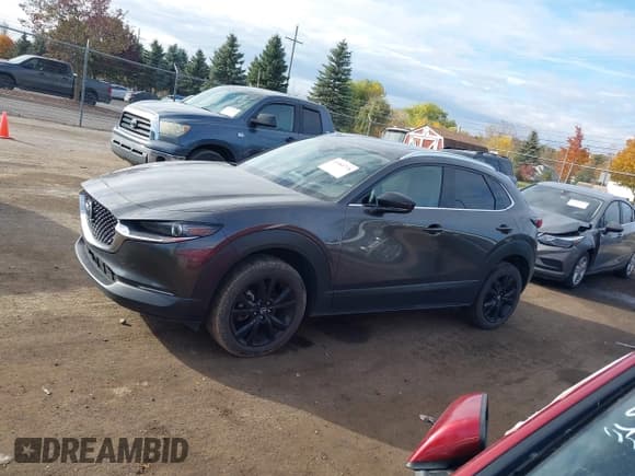 ✅ 2021 Mazda CX-30 Premium • VIN: 3MVDMBDYXMM263289 • Lot: 43580728. Listed on IAAI with 29,453 mi. Free auction sales archive from the USA and detailed vehicle history report at DreamBid. Image 14.