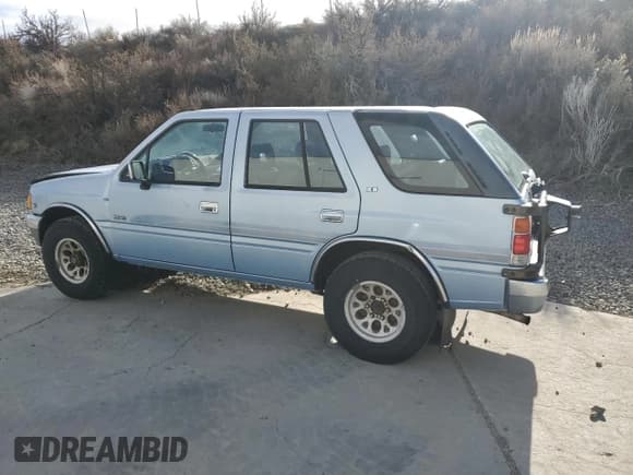 ✅ 1992 Isuzu Rodeo • VIN: 4S2CY58Z2N4341636 • Lot: 45606315. Listed on Copart with 235,683 mi. Free auction sales archive from the USA and detailed vehicle history report at DreamBid. Image 2.