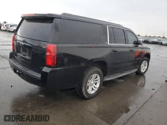 2015 Chevrolet Suburban LT with VIN 1GNSKJKC4FR631247, listed as a Copart auction lot 81781684 with 157,269 mi miles and Clean title. Bid and sale history available at DreamBid. Image 3.