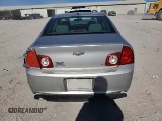 ✅ 2009 Chevrolet Malibu 1LS • VIN: 1G1ZG57B99F147203 • Lot: 76895924. Listed on Copart with 122,105 mi. Free auction sales archive from the USA and detailed vehicle history report at DreamBid. Image 6.