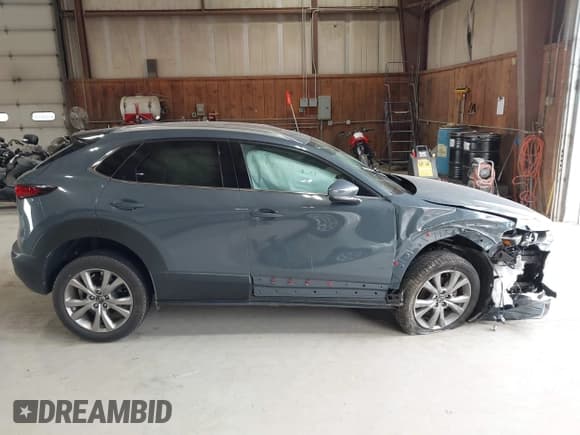 ✅ 2021 Mazda CX-30 Premium • VIN: 3MVDMBDM4MM217681 • Лот: 43559075. Опубликован ранее на IAAI с пробегом 49 118 миль. Бесплатный доступ к архиву аукционных продаж из США и подробный отчёт об истории автомобиля на DreamBid. Изображение 13.