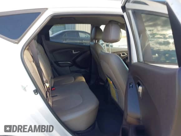2014 Hyundai Tucson Limited with VIN KM8JU3AG6EU791944, listed as a IAAI auction lot 43436689 with 167,083 mi miles and . Bid and sale history available at DreamBid. Image 8.