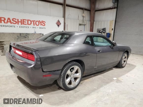 ✅ 2014 Dodge Challenger SXT • VIN: 2C3CDYAG9EH133472 • Lot: 44821425. Wystawiony na Copart z przebiegiem 132 298 mil. Bezpłatny archiwum sprzedaży aukcyjnych z USA i szczegółowy raport historii pojazdu na DreamBid. Zdjęcie 3.