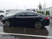 ✅ 2016 Ford Fusion Titanium • VIN: 3FA6P0K91GR135375 • Lot: 43865065. Listed on IAAI with 174,589 mi. Free auction sales archive from the USA and detailed vehicle history report at DreamBid. Image 14.