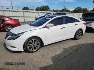 2013 Hyundai Sonata SE with VIN 5NPEC4AB0DH657992, listed as a Copart auction lot 85679085 with 153,511 mi miles and Salvage title. Bid and sale history available at DreamBid. Image 1.
