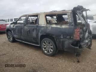 2015 Chevrolet Suburban LTZ z VIN 1GNSKKKC5FR705376, wystawiony jako Copart lot #70946015 z przebiegiem Nie podano mil oraz Czysty tytuł • Clean title. Historia ofert i sprzedaży dostępna na DreamBid. Obrazek 2.