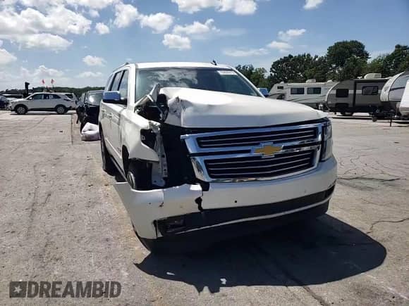 2015 Chevrolet Tahoe LTZ с VIN 1GNSKCKC2FR308598, выставлен на аукционе Copart как лот 65639215 с пробегом 176 499 миль миль и Списание • Salvage title. История ставок и продаж доступна на DreamBid. Изображение 14.