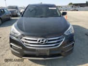 ✅ 2018 Hyundai Santa Fe 2.4L • VIN: 5NMZT3LB0JH095853 • Lot: 59963125. Listed on Copart with 128,186 mi. Free auction sales archive from the USA and detailed vehicle history report at DreamBid. Image 5.