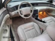 ✅ 1996 Lincoln Mark VIII • VIN: 1LNLM91VXTY605029 • Lot: 55109384. Wystawiony na Copart z przebiegiem 140 696 mil. Bezpłatny archiwum sprzedaży aukcyjnych z USA i szczegółowy raport historii pojazdu na DreamBid. Zdjęcie 8.