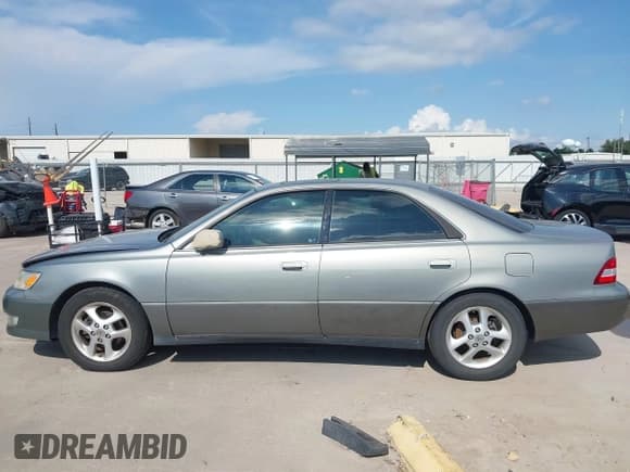 ✅ 2000 Lexus ES 300 • VIN: JT8BF28G8Y0262430 • Lot: 42939524. Listed on IAAI with 166,765 mi. Free auction sales archive from the USA and detailed vehicle history report at DreamBid. Image 14.