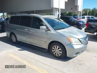 ✅ 2010 Honda Odyssey EX-L • VIN: 5FNRL3H72AB078235 • Lot: 43680878. Listed on IAAI with 165,916 mi. Free auction sales archive from the USA and detailed vehicle history report at DreamBid. Image 1.