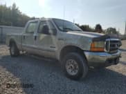 ✅ 1999 Ford F-250 XL • VIN: 1FTNW21F8XEE05989 • Lot: 80967565. Listed on Copart with 216,840 mi. Free auction sales archive from the USA and detailed vehicle history report at DreamBid. Image 4.