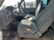 ✅ 1993 Ford F-150 • VIN: 1FTEX15N1PKA32563 • Lot: 59503795. Wystawiony na Copart z przebiegiem 227 437 mil. Bezpłatny archiwum sprzedaży aukcyjnych z USA i szczegółowy raport historii pojazdu na DreamBid. Zdjęcie 7.