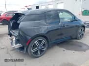 ✅ 2015 BMW i3 • VIN: WBY1Z4C57FV501034 • Lot: 41950152. Listed on IAAI with 47,207 mi. Free auction sales archive from the USA and detailed vehicle history report at DreamBid. Image 4.