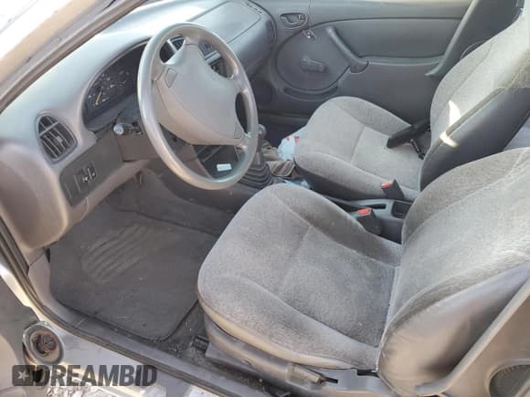 ✅ 2001 Suzuki Swift GA • VIN: 2S2AB21H516602339 • Lot: 50135584. Listed on Copart with 142,476 mi. Free auction sales archive from the USA and detailed vehicle history report at DreamBid. Image 7.