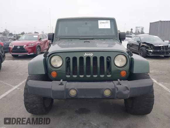 ✅ 2007 Jeep Wrangler Unlimited Sahara • VIN: 1J4GA59147L218594 • Lot: 42984397. Listed on IAAI with 108,296 mi. Free auction sales archive from the USA and detailed vehicle history report at DreamBid. Image 13.