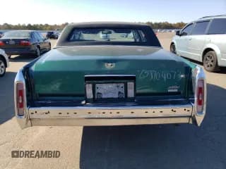 ✅ 1992 Cadillac Brougham • VIN: 1G6DW547XNR703499 • Лот: 66709103. Опубликован ранее на Copart с пробегом Не указан. Бесплатный доступ к архиву аукционных продаж из США и подробный отчёт об истории автомобиля на DreamBid. Изображение 6.