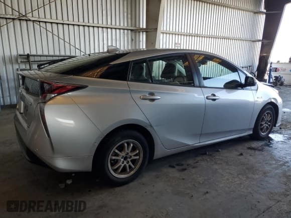 ✅ 2017 Toyota Prius Three • VIN: JTDKARFU6H3031476 • Lot: 82332065. Listed on Copart with 63,930 mi. Free auction sales archive from the USA and detailed vehicle history report at DreamBid. Image 3.