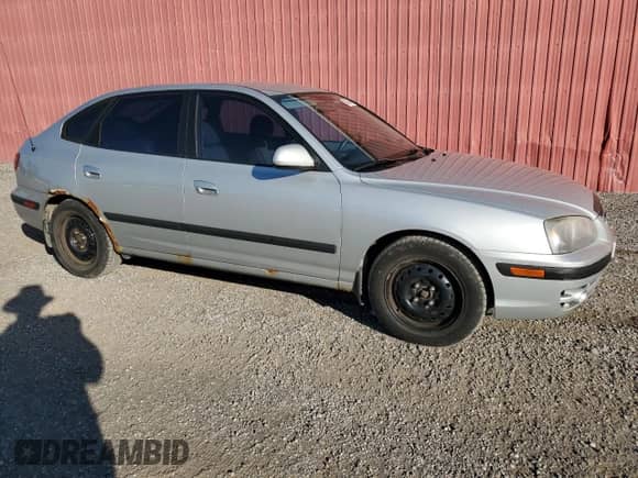 2005 Hyundai Elantra with VIN KMHDM55D15U161824, listed as a Copart auction lot 70708374 with 146,974 mi miles and Clean title. Bid and sale history available at DreamBid. Image 4.