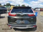 ✅ 2017 Honda CR-V Touring • VIN: 2HKRW2H93HH656728 • Лот: 80729125. Опубликован ранее на Copart с пробегом 96 644 миль. Бесплатный доступ к архиву аукционных продаж из США и подробный отчёт об истории автомобиля на DreamBid. Изображение 6.