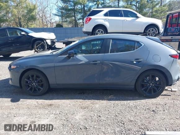 ✅ 2025 Mazda 3 S Carbon Edition • VIN: JM1BPBLM9S1757295 • Lot: 41772054. Listed on IAAI with 2,527 mi. Free auction sales archive from the USA and detailed vehicle history report at DreamBid. Image 14.