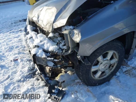 ✅ 2007 GMC Envoy SLT • VIN: 1GKDT13S072122985 • Lot: 41512818. Listed on IAAI with 139,289 mi. Free auction sales archive from the USA and detailed vehicle history report at DreamBid. Image 6.