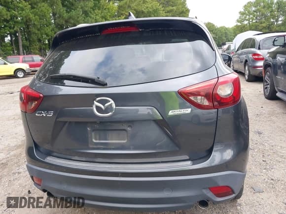 ✅ 2016 Mazda CX-5 Grand Touring • VIN: JM3KE2DY6G0840159 • Lot: 43179646. Wystawiony na IAAI z przebiegiem 71 500 mil. Bezpłatny archiwum sprzedaży aukcyjnych z USA i szczegółowy raport historii pojazdu na DreamBid. Zdjęcie 16.