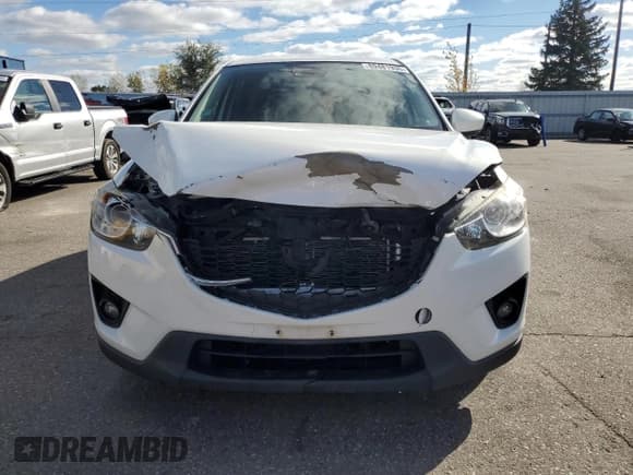 ✅ 2015 Mazda CX-5 Grand Touring • VIN: JM3KE4DY3F0443308 • Лот: 89481935. Опубликован ранее на Copart с пробегом 152 356 миль. Бесплатный доступ к архиву аукционных продаж из США и подробный отчёт об истории автомобиля на DreamBid. Изображение 5.