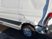 ✅ 2022 Ford Transit Cargo • VIN: 1FTBR1Y82NKA09132 • Lot: 43425910. Listed on IAAI with 47,411 mi. Free auction sales archive from the USA and detailed vehicle history report at DreamBid. Image 17.