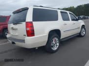 ✅ 2010 Chevrolet Suburban LTZ • VIN: 1GNUKKE35AR165749 • Lot: 43431739. Listed on IAAI with 221,583 mi. Free auction sales archive from the USA and detailed vehicle history report at DreamBid. Image 4.