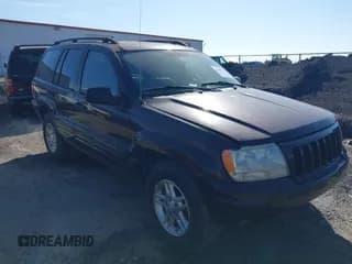 ✅ 2004 Jeep Grand Cherokee • VIN: 1J8GX48S24C266933 • Lot: 41497122. Listed on IAAI with 200,899 mi. Free auction sales archive from the USA and detailed vehicle history report at DreamBid. Image 1.